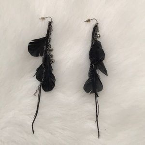 Black dangle feather earrings